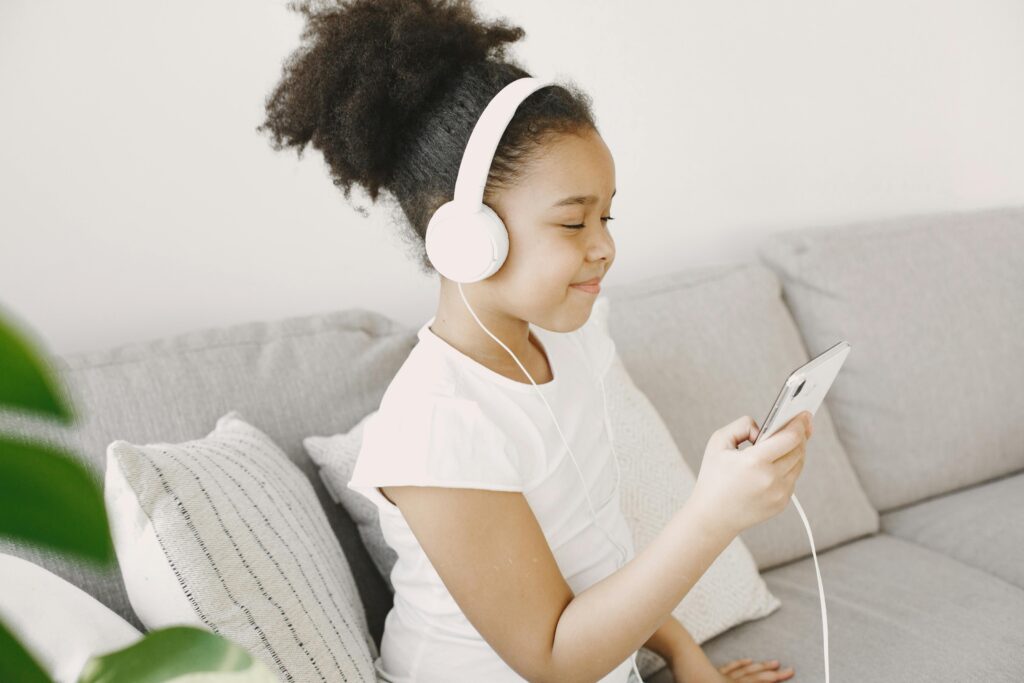 A child operating a smartphone